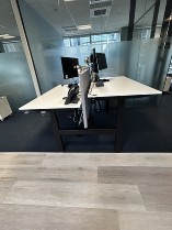 used sit stand back to back desks