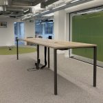 Techo Bench 4.2M Hi Table Oak on unfinished metal frame with 2 x Data Port