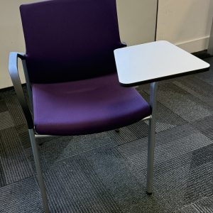 Stackable chairs with writing tablet