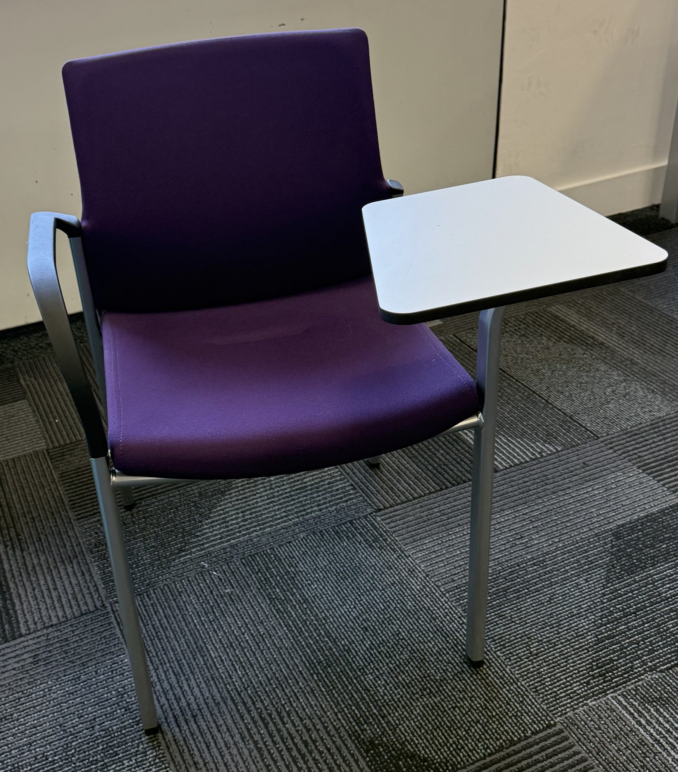 Stackable chairs with writing tablet