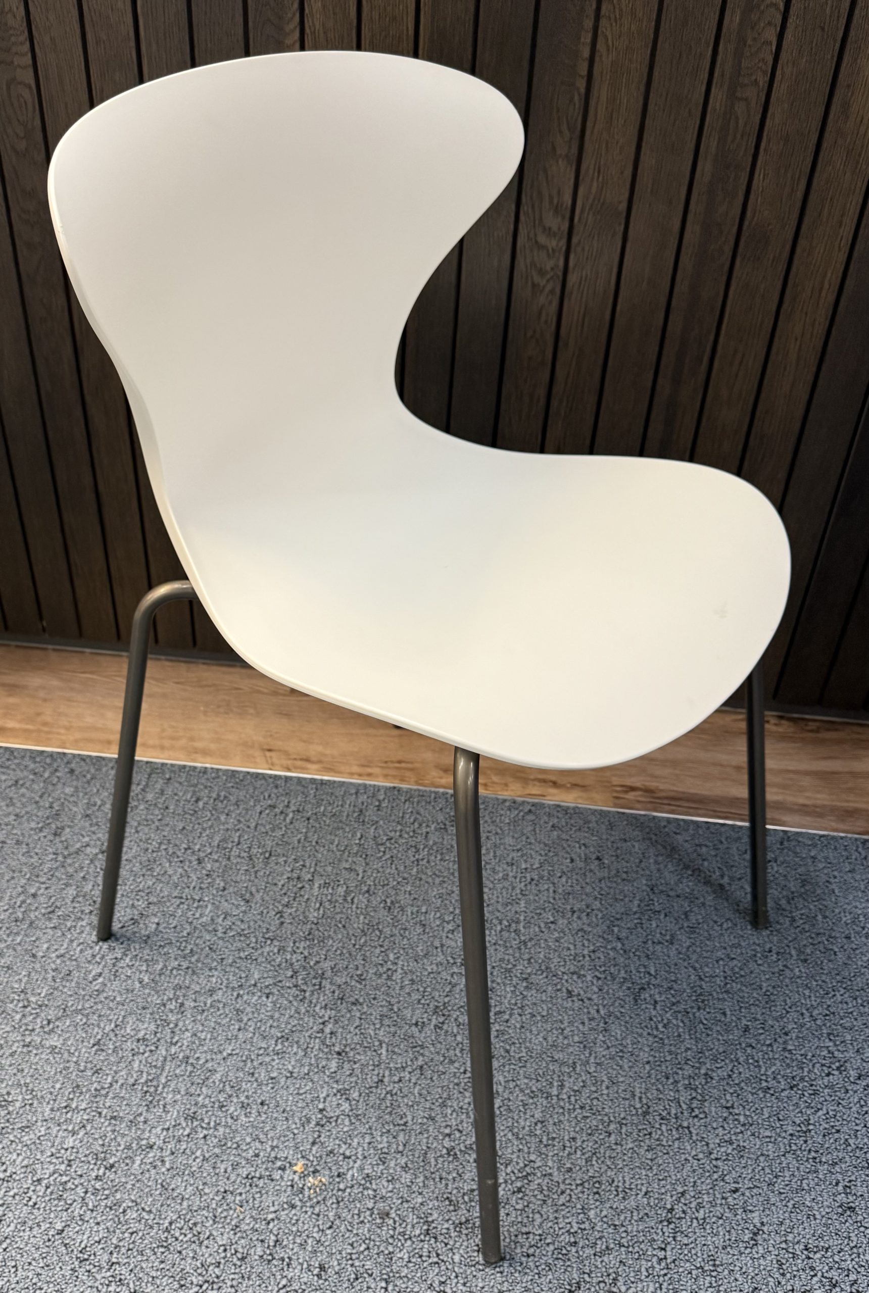 Used Frovi Ego White Pu stacking Breakout chair on metal legs