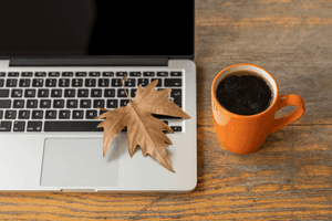 Autumn workspace with laptop and seasonal accents