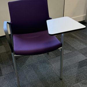 Stackable chairs with writing tablet